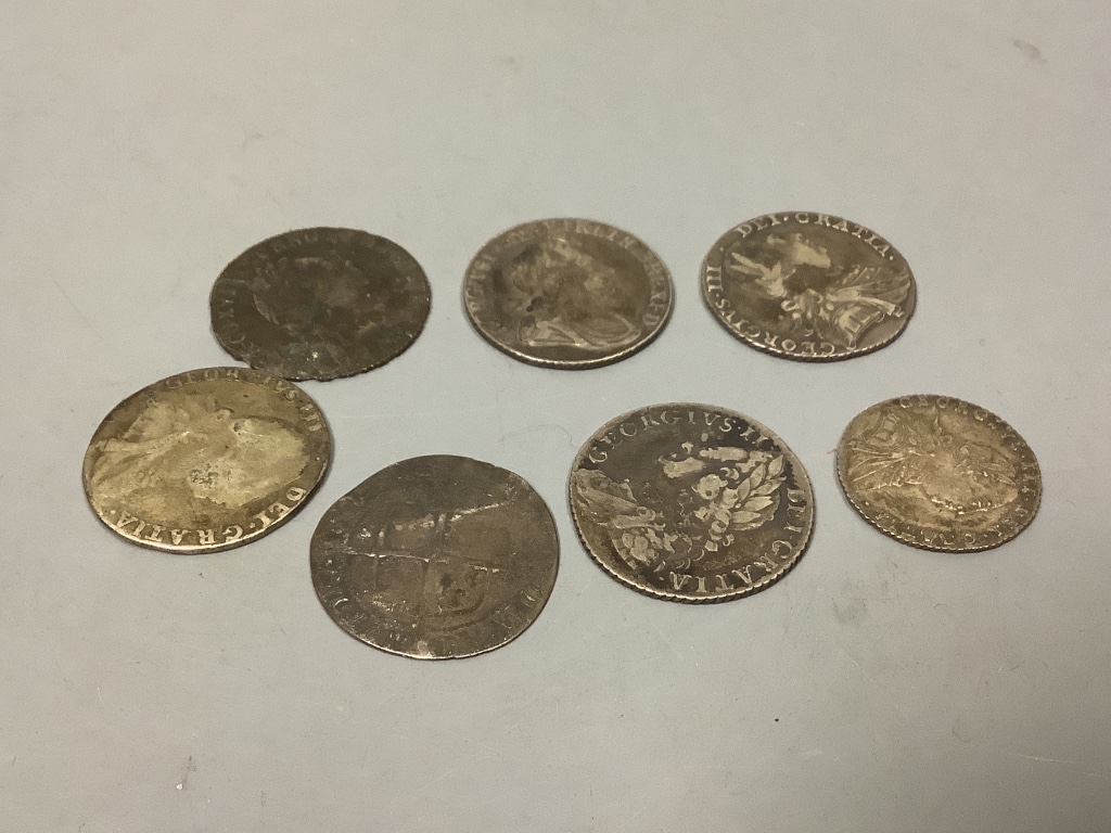 Six 18th century shillings and a sixpence